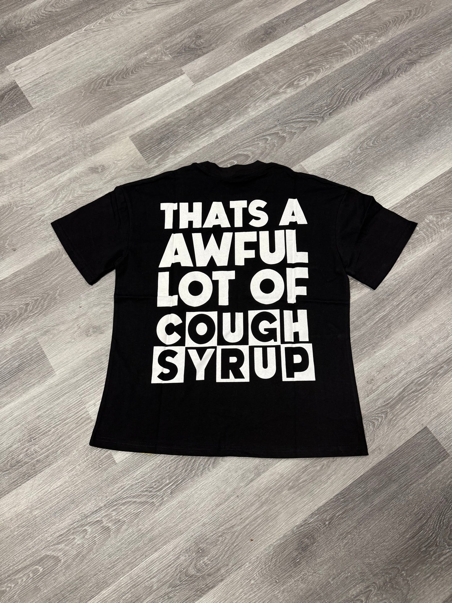 Thats a Awful Lot of Cough Syrup Cartoon Tee (Black)