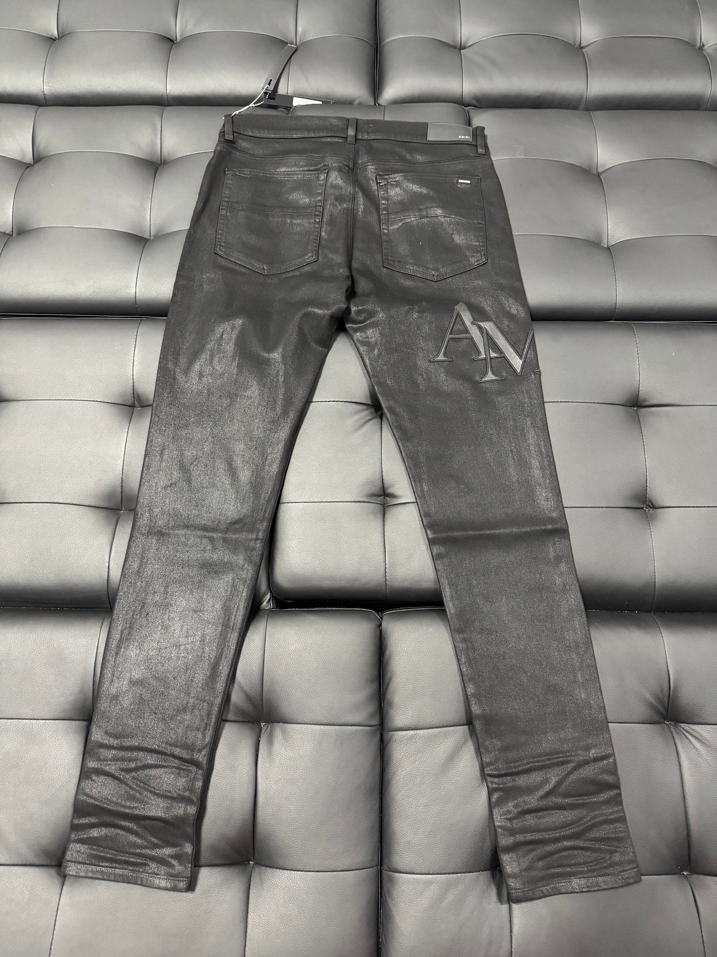 Amiri Black Wax Staggered Logo Denim Jeans