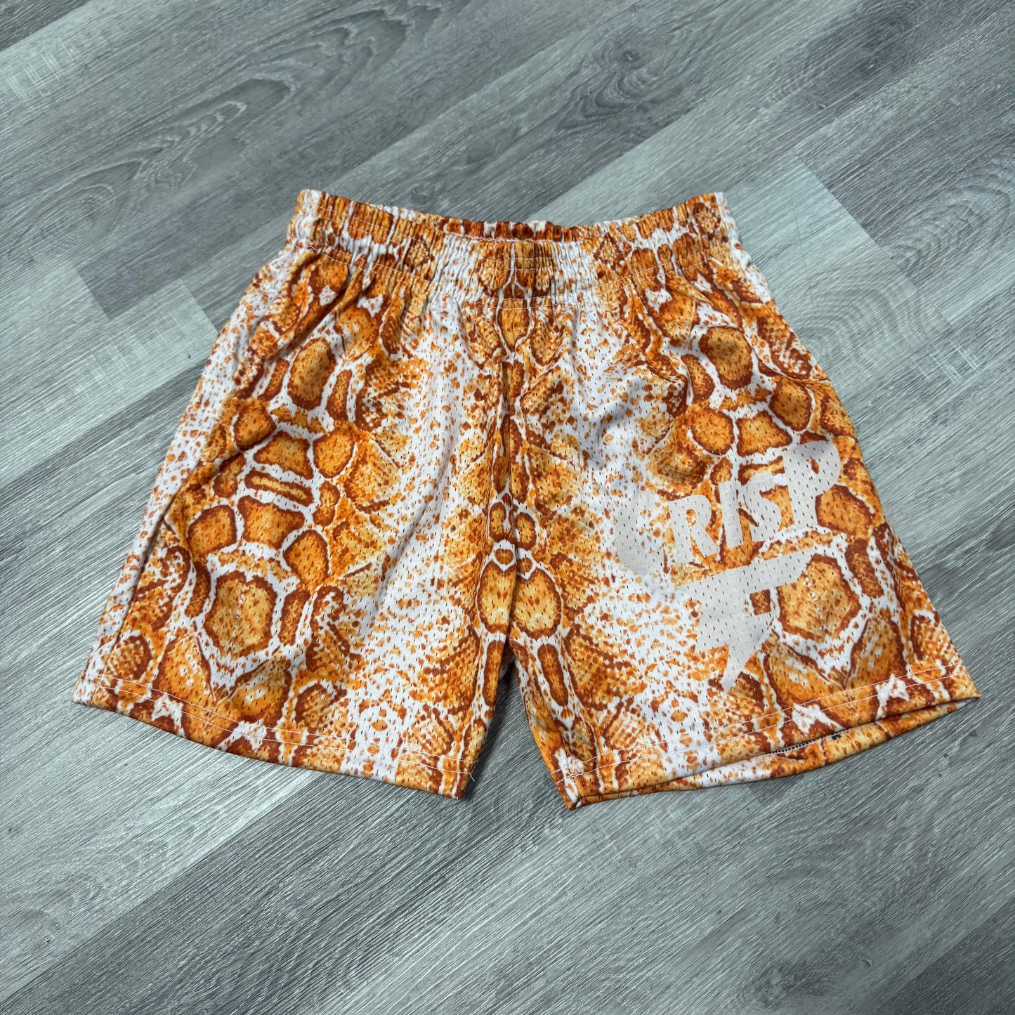 Crispy NYC Orange Snakeskin Mesh Shorts