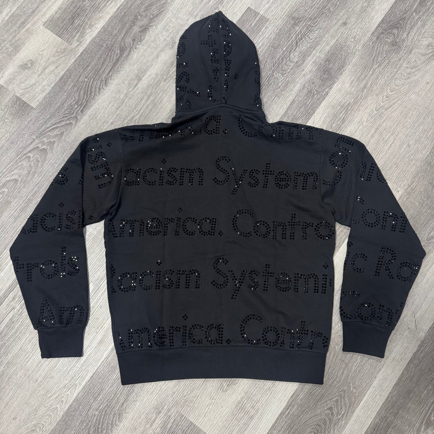 Denim Tears Systemic Racism Controls America Zip Up Hoodie