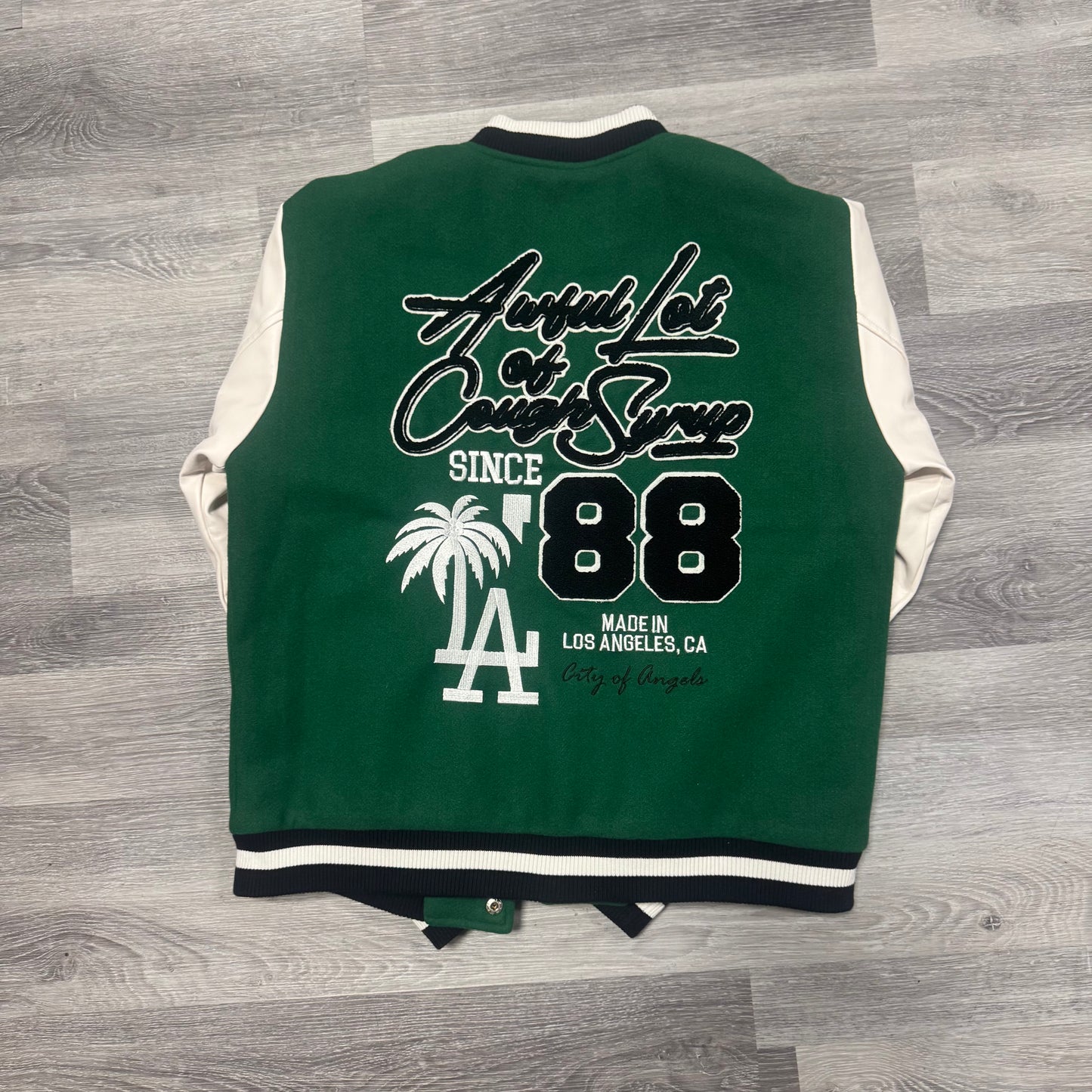 Thats A Awful Lot Of Cough Syrup Varsity Jacket (Green)