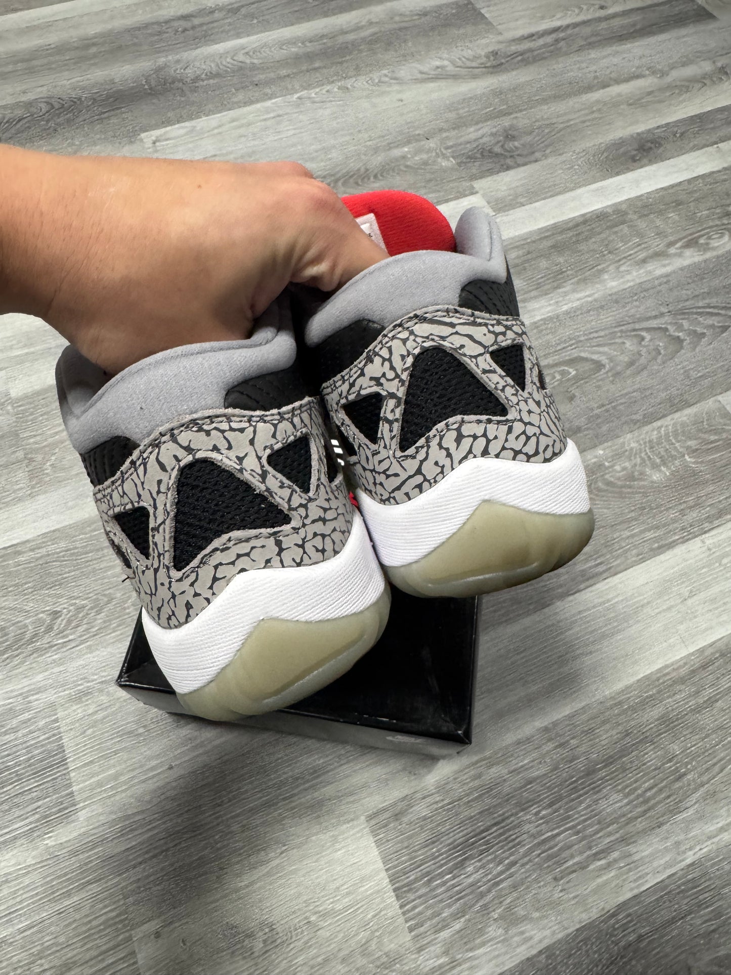 Jordan 11 Low IE Black Cement / Preowned