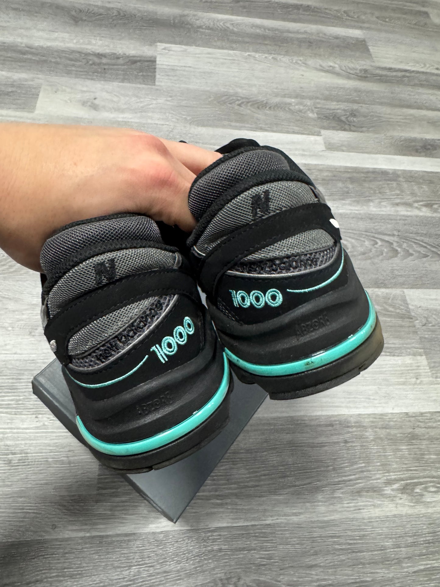 New Balance 1000 Black Tiffany Blue / Preowned