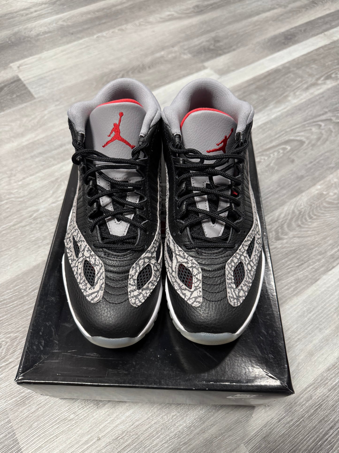 Jordan 11 Low IE Black Cement / Preowned