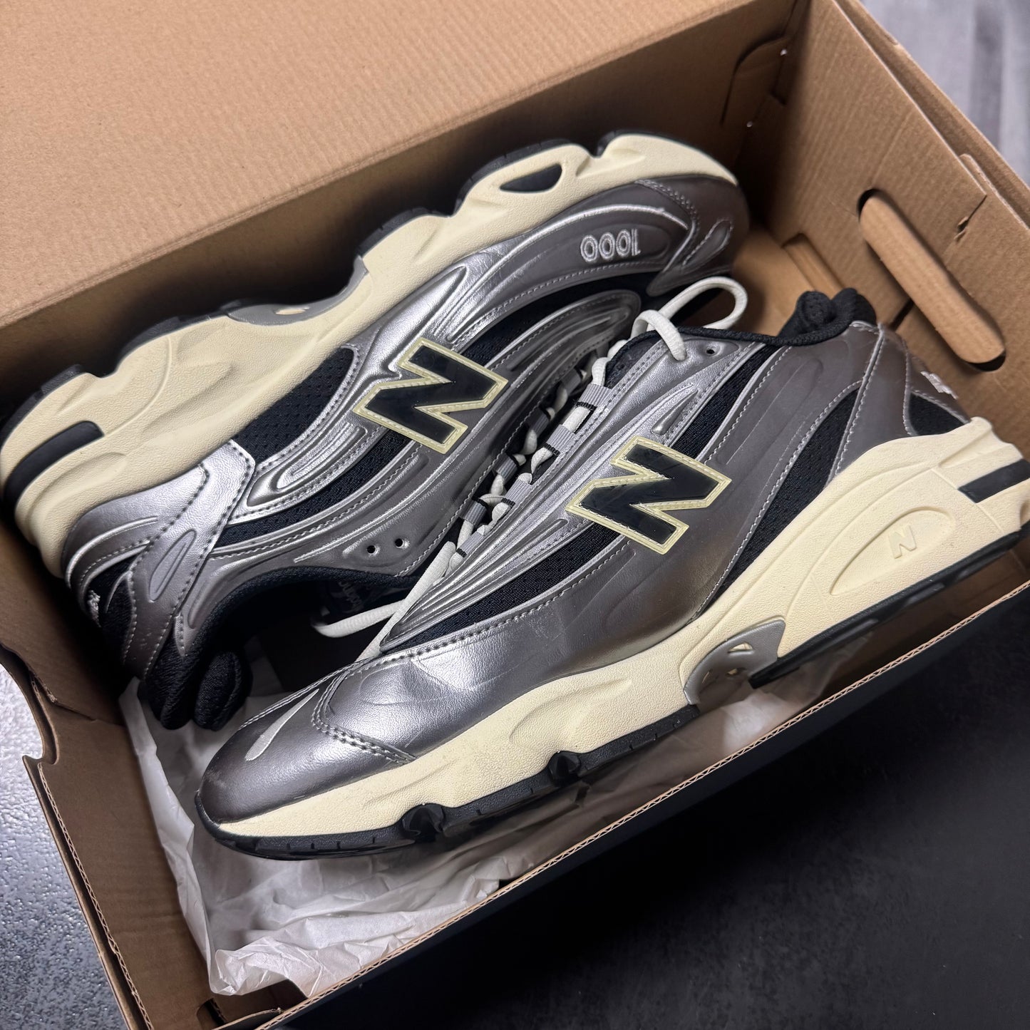 New Balance 1000 Silver Metallic / Preowned