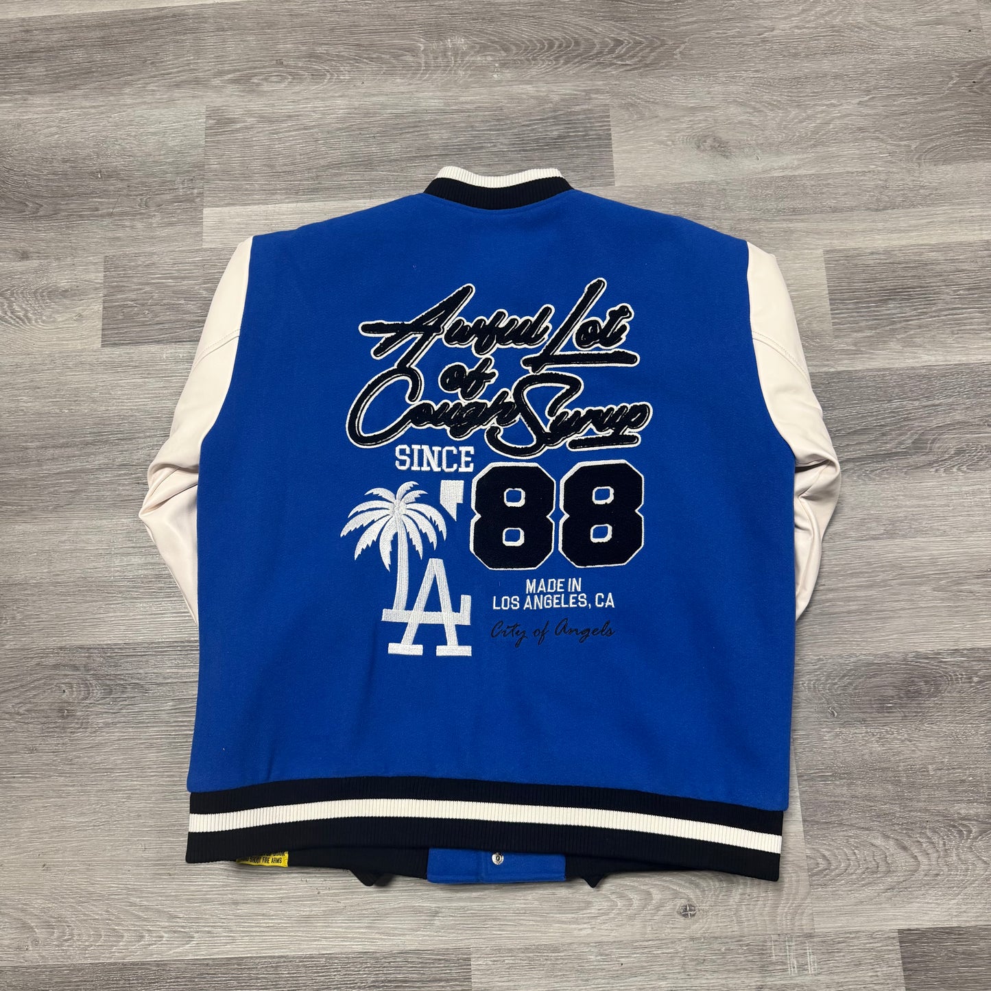 That’s A Awful Lot Of Cough Syrup Varsity Jacket (Blue)