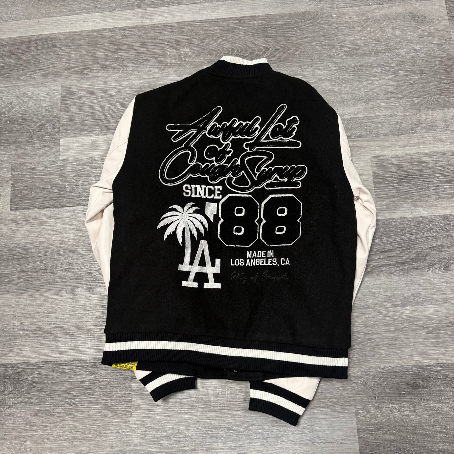 That’s A Awful Lot Of Cough Syrup Varsity Jacket (Black)