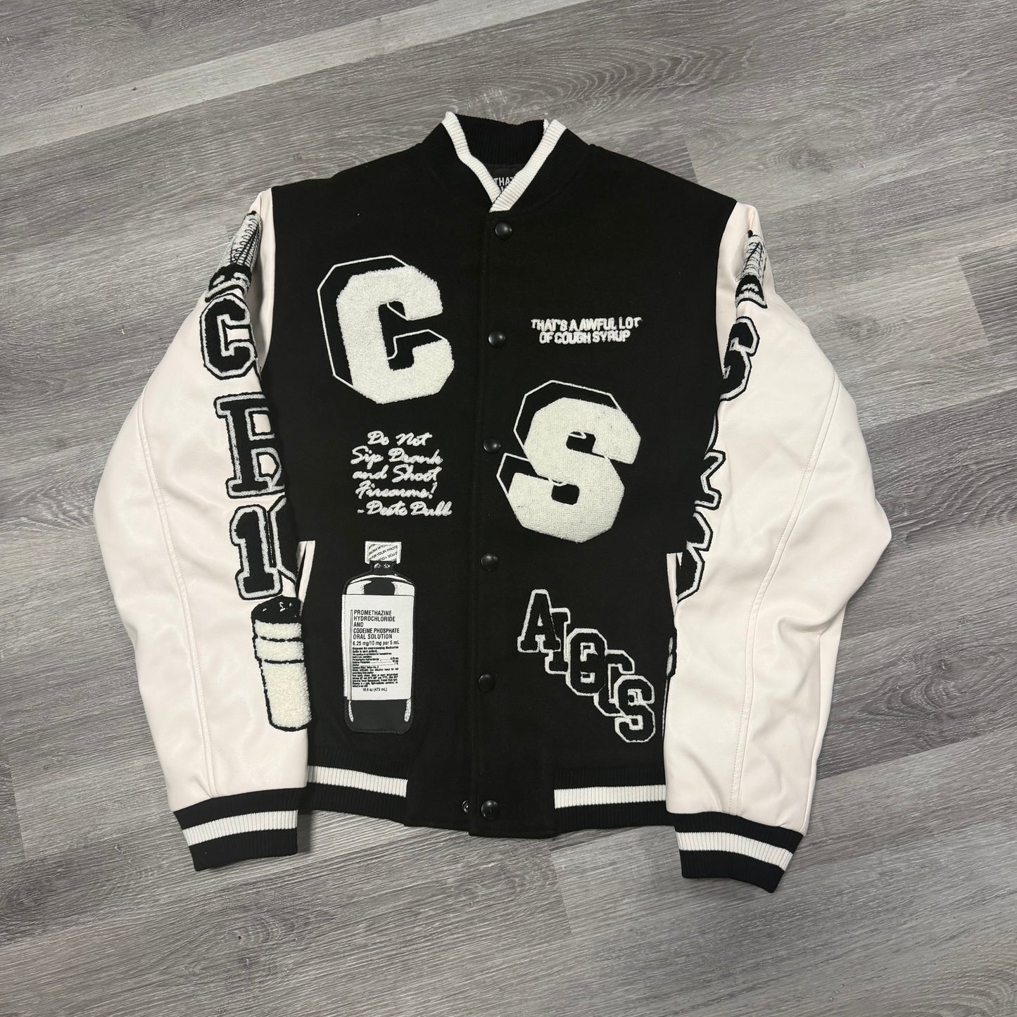 That’s A Awful Lot Of Cough Syrup Varsity Jacket (Black)