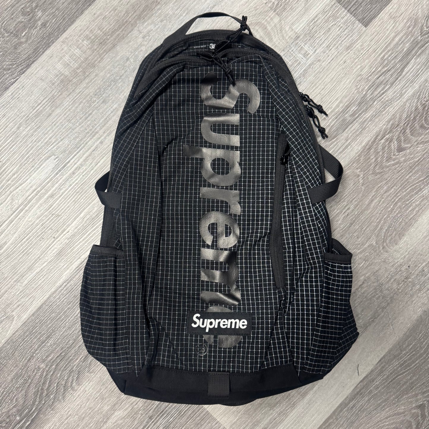 Supreme Grid Outline Backpack