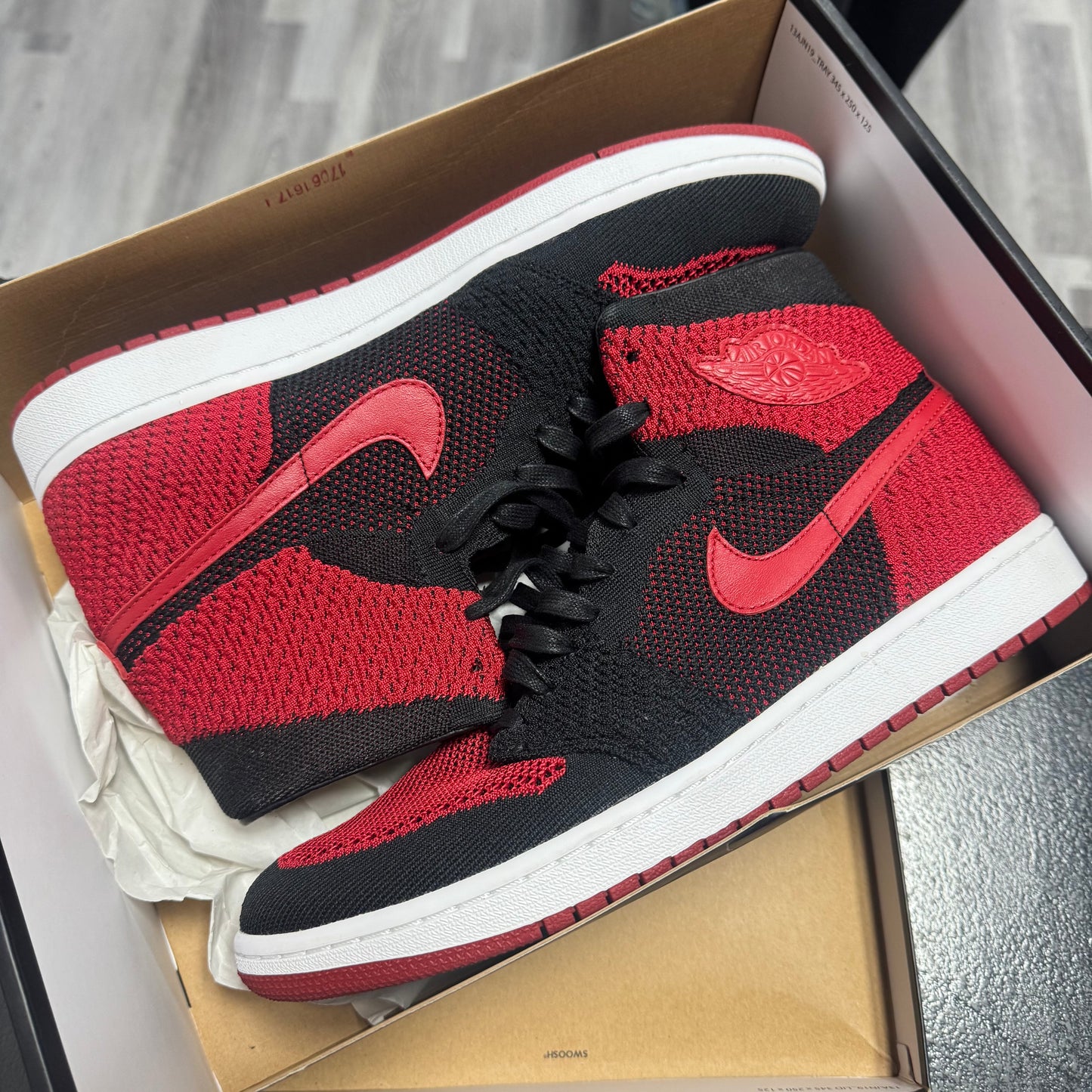 Jordan 1 Flyknit Bred / Preowned